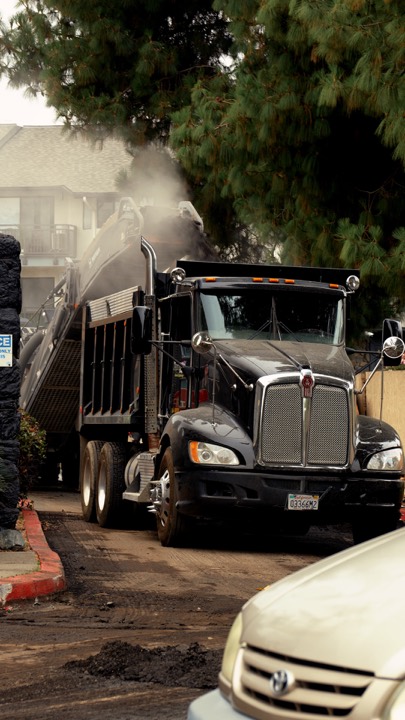 Dump truck working in dust